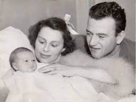 Josephine Wayne and John Wayne with their first child Michael
